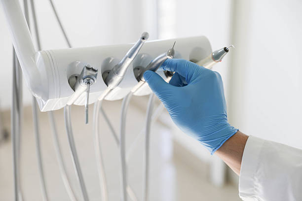 Professional Wisdom Tooth Removal technician working in Shirley, NY